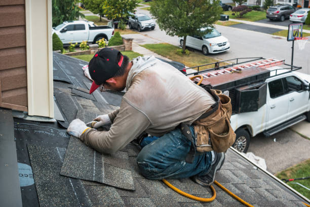Professional Roofing technician working in Harvard, IL